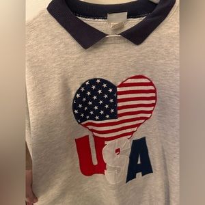 Women’s USA crewneck, small tear in sleeve
